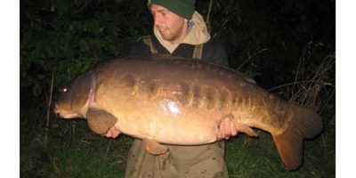 Matt Bryant with The Parrot at 62lb 8oz.jpg